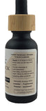 Black bottle with wooden cap and label on a white background